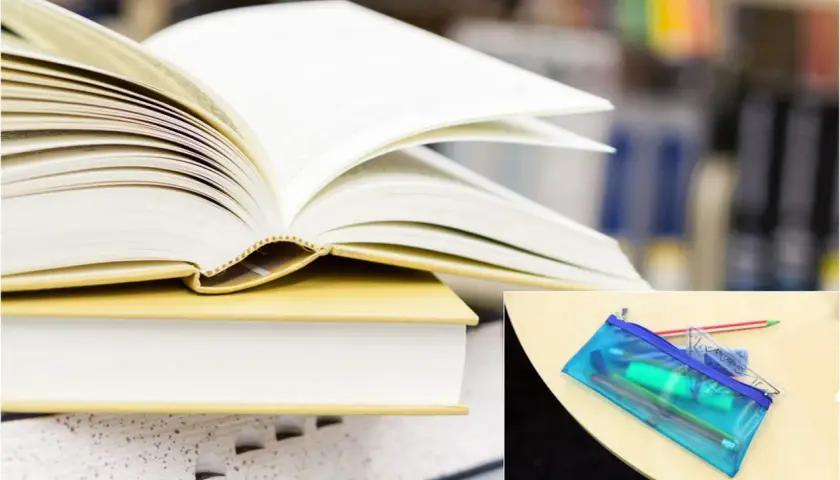 Libri aperti e una bustina trasparente con matite e righello, un vero bonus libri per lo studio.